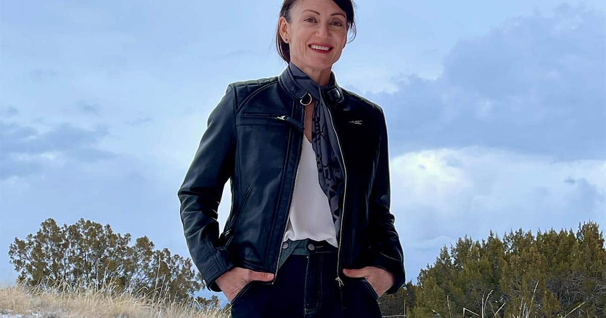 Catherine Brock wearing leather moto jacket from FanJackets.