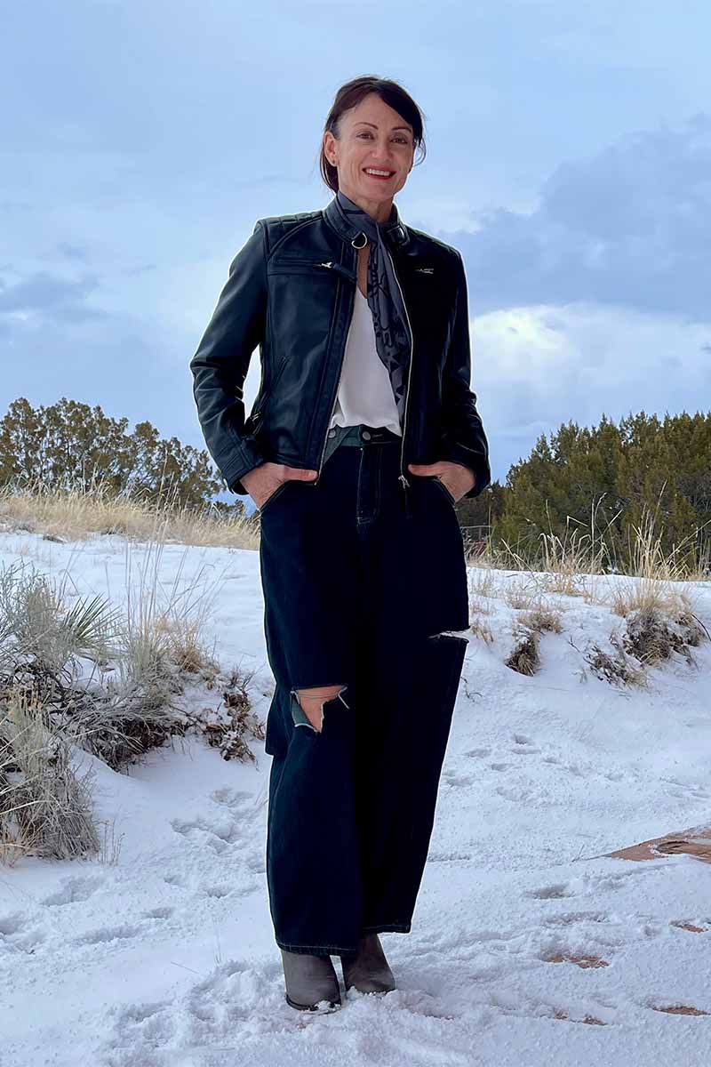 Catherine Brock wearing leather moto jacket from FanJackets.