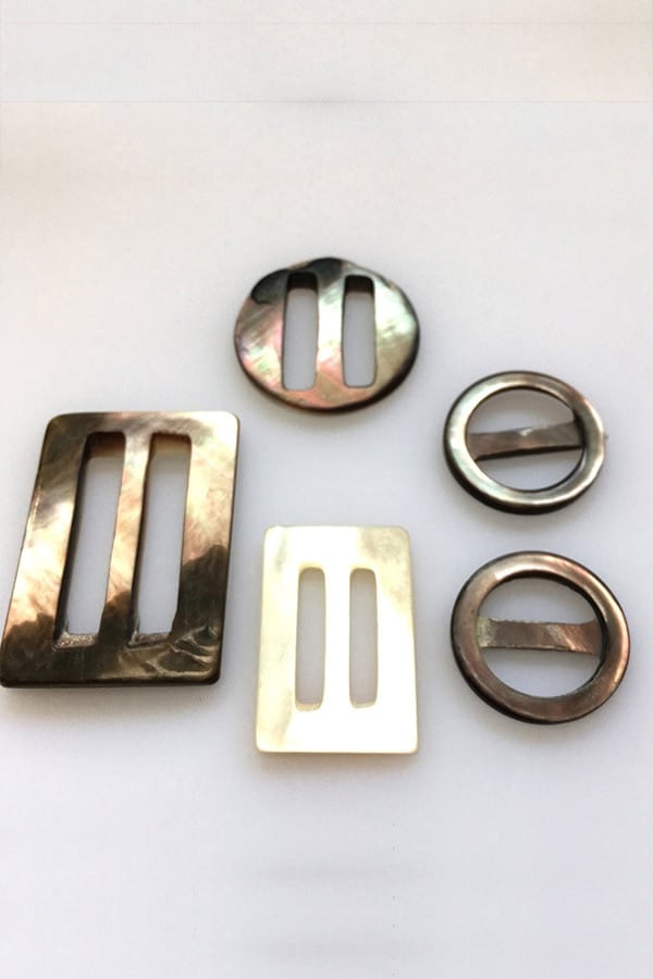 Mother of pearl belt buckles as budget-friendly wardrobe update