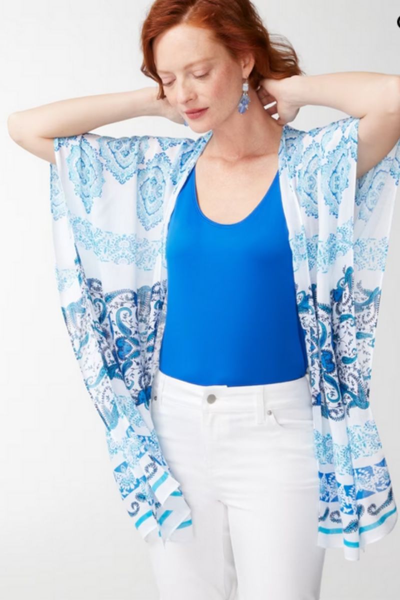 Woman over 60 wears trendy spring fashion: pretty blue ruanna.