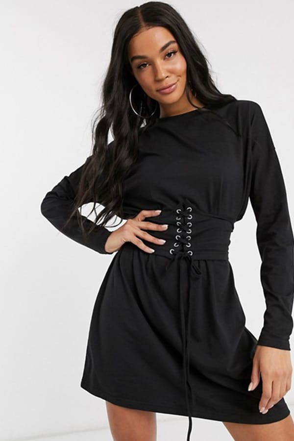 Woman wearing corset dress