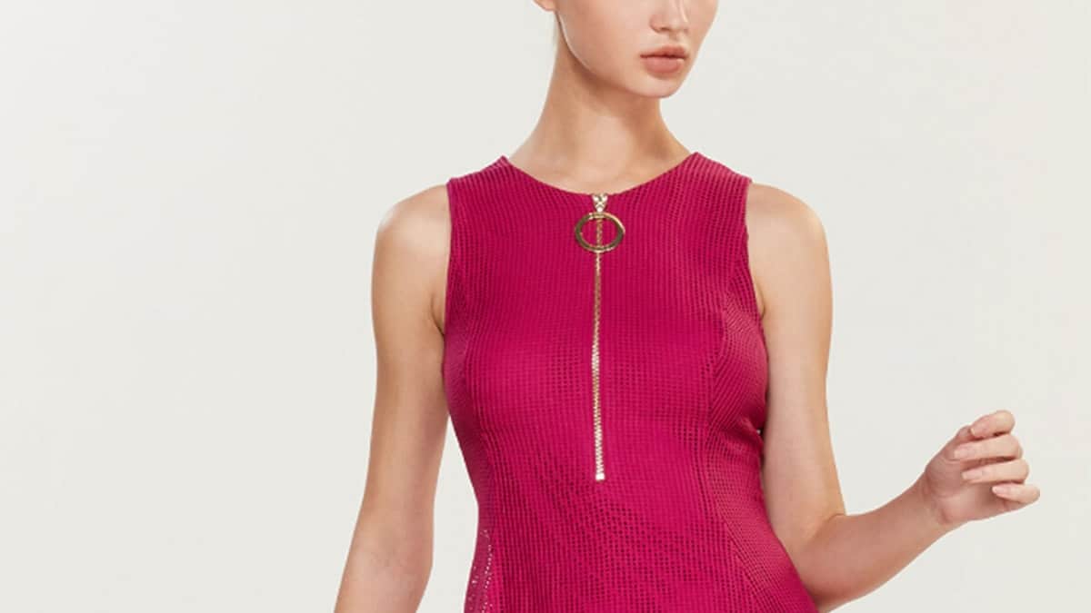Woman wearing dress with exposed zipper