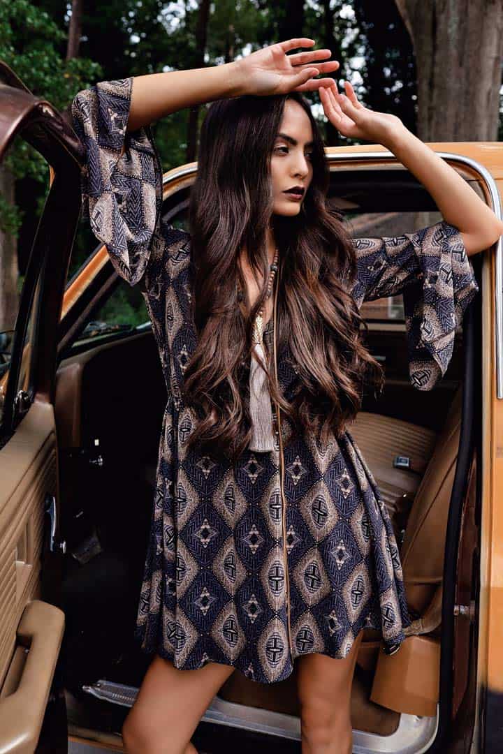 Woman wearing short dress with geometric pattern