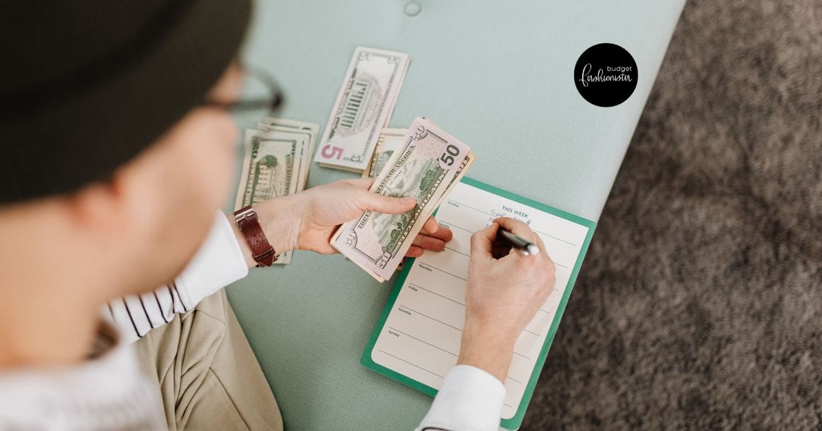 Woman counting cash and making a budget due to inflation.