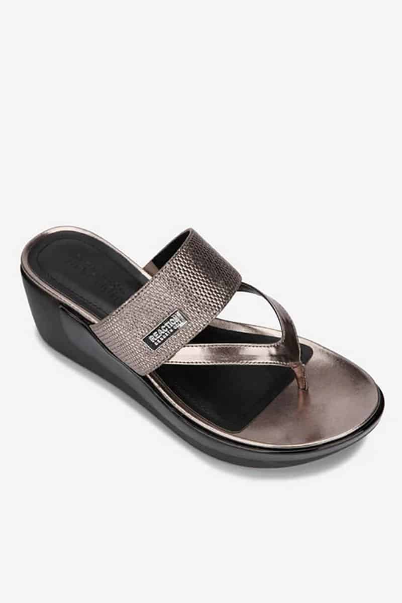 9 more stunning spring shoe trends to shop now 3 Metallic wedge thong sandals.