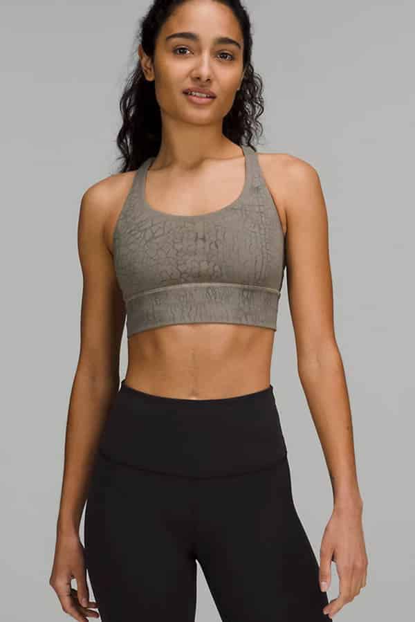 9 best online stores to buy affordable workout clothes for women 5 Model wearing Lululemon sports bra.