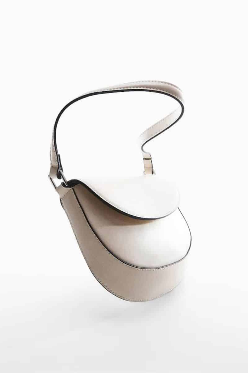 White purse from Mango with black edging. 