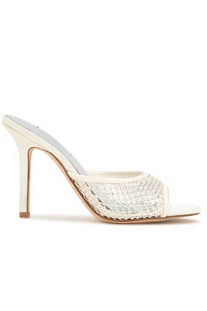 9 more stunning spring shoe trends to shop now 4 Ivory slide sandal with mesh panel.