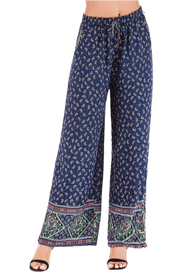 Close-up of model wearing palazzo pants.