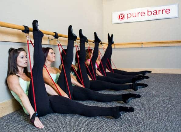 Woman participating in barre class