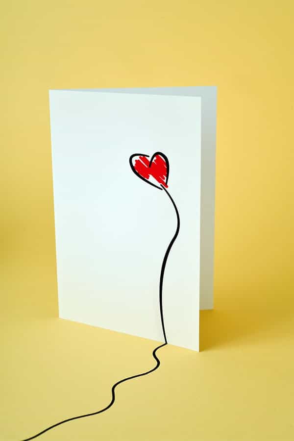 5 clever and romantic anniversary ideas 1 Card with a heart on it