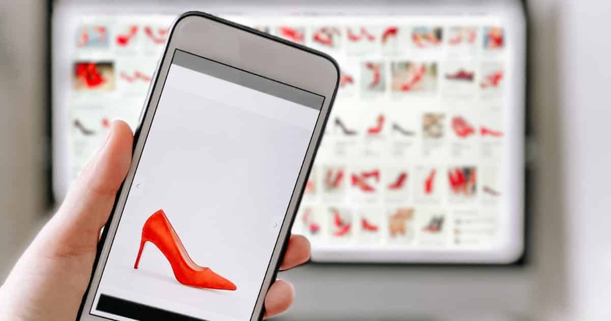 View of smartphone while user shops online.