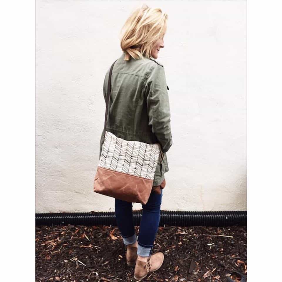 alpharetta shopping guide - sis & moon's - model wearing green jacket