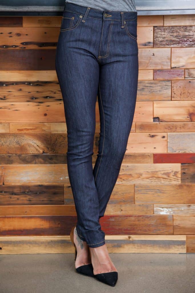 waist down of woman wearing skinny jeans