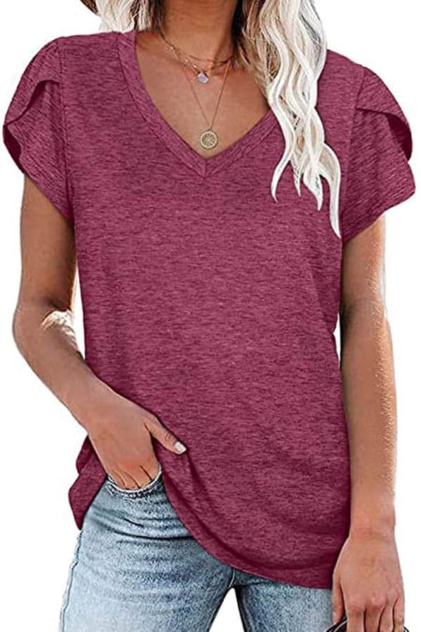 25 summer outfits on the cheap: Get 'em all for $200 2 Close-up of woman wearing rose t-shirt, an essential piece for summer outfits.