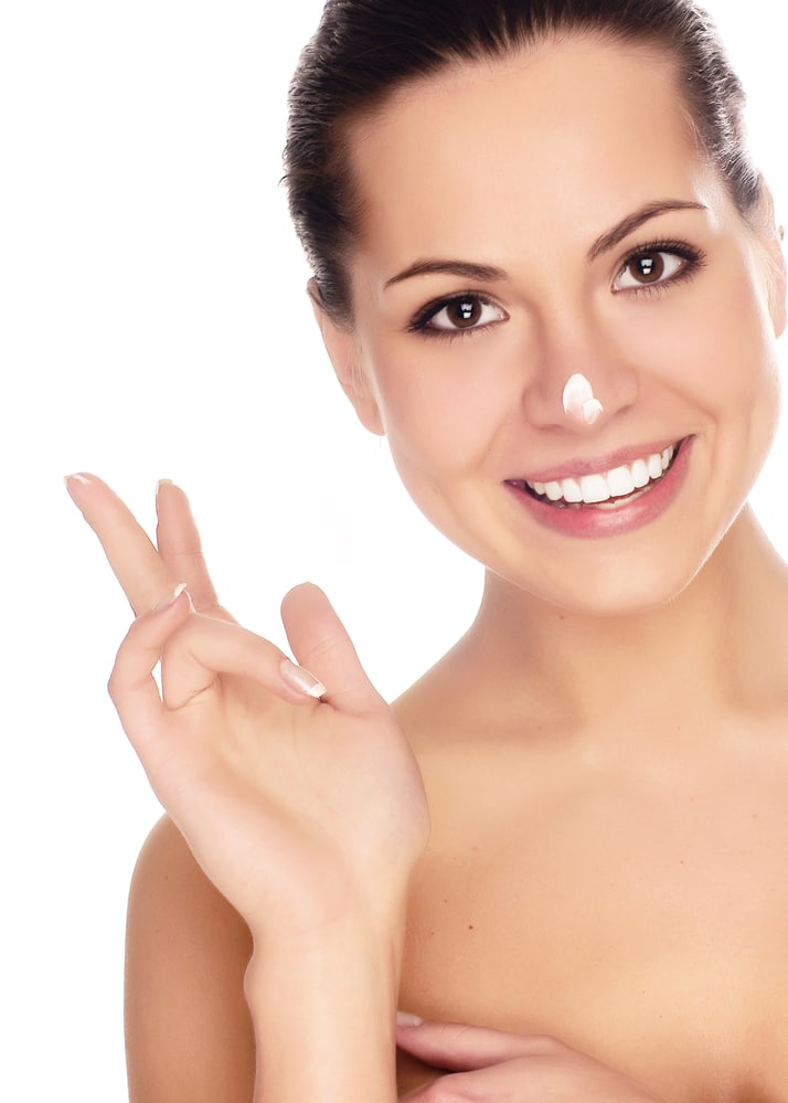 Over your regular beauty routine? Me too! Summer beauty hacks you'll love 1 Woman applying facial cream