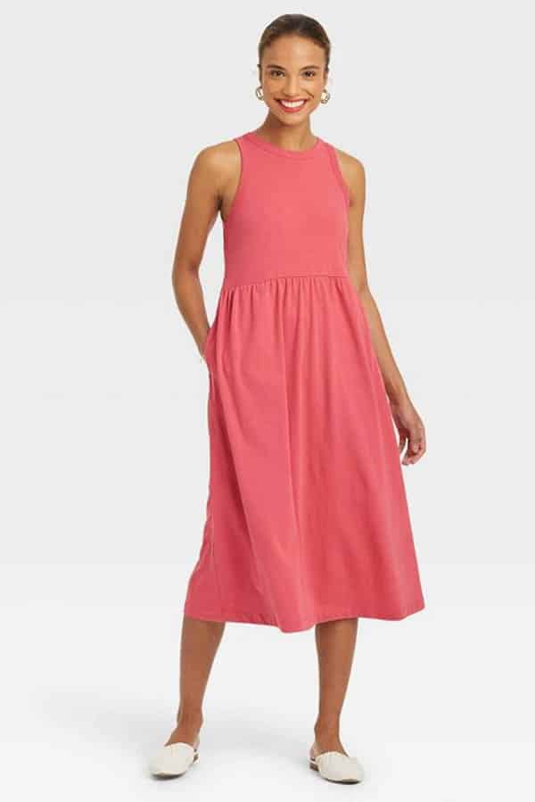 Shop these 14 best fashion and beauty labor day sales & save up to 75% 8 Women wears coral cotton dress.
