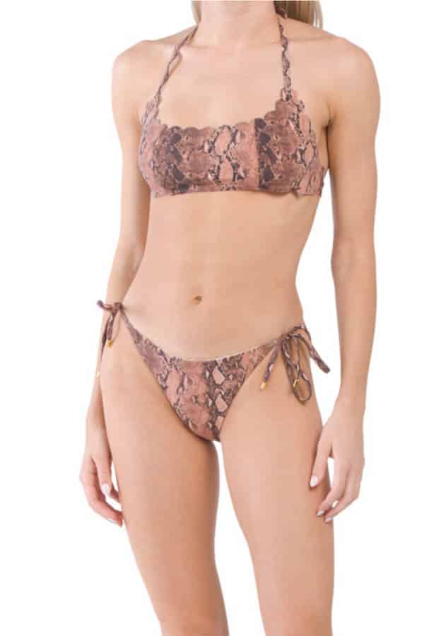 The best stores for end-of-summer swimwear deals 10 Model wearing animal print bikini from TJ Maxx.