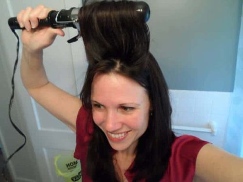 Step 1 of this updo tutorial: curl with a 1 or 1 1/2 inch curling iron 
