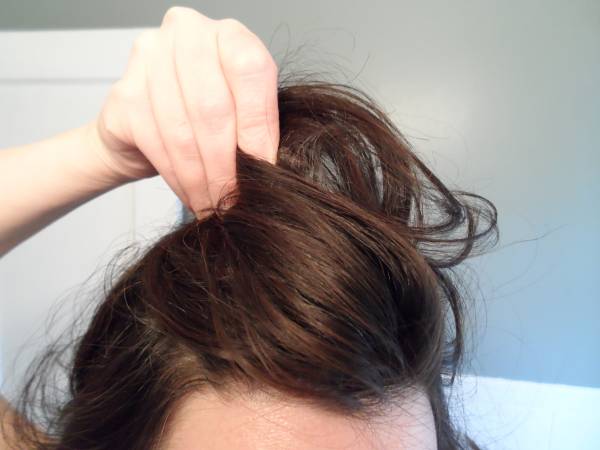 step 4 of updo tutorial: twist hair 