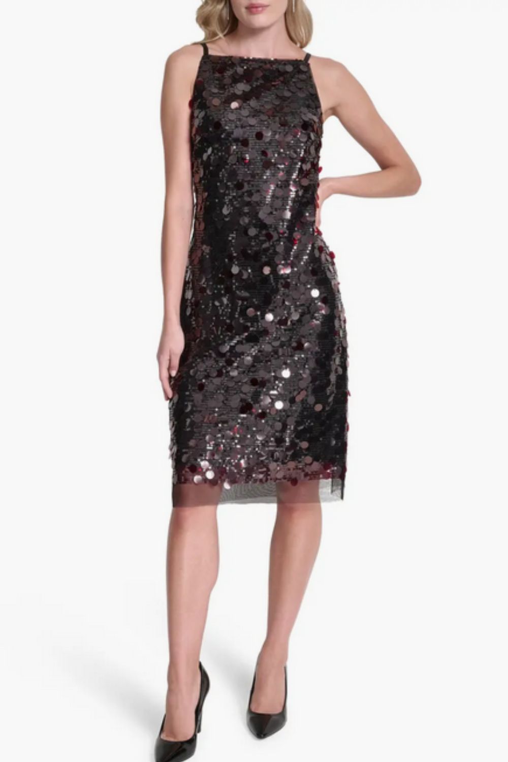Model wears shift dress with sequins 