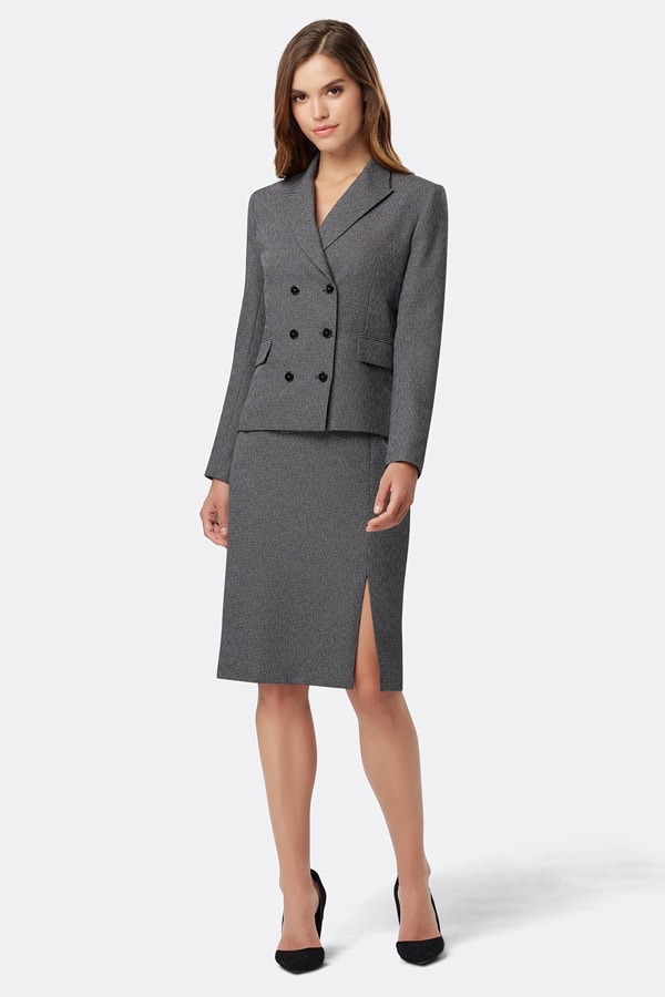 Woman wearing dark grey suit