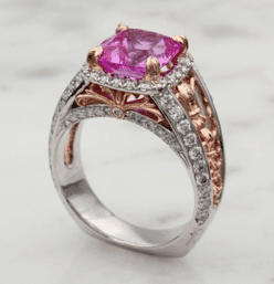 5 steps to designing your own wedding ring on a budget 3 Custom ring with two-tone metal and a pink stone