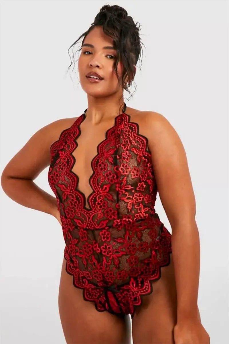 Model wearing lacy bodysuit.