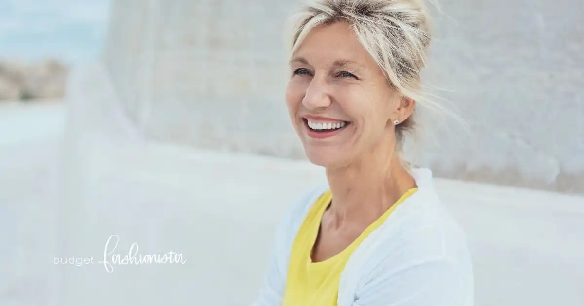 Smiling older woman outside.